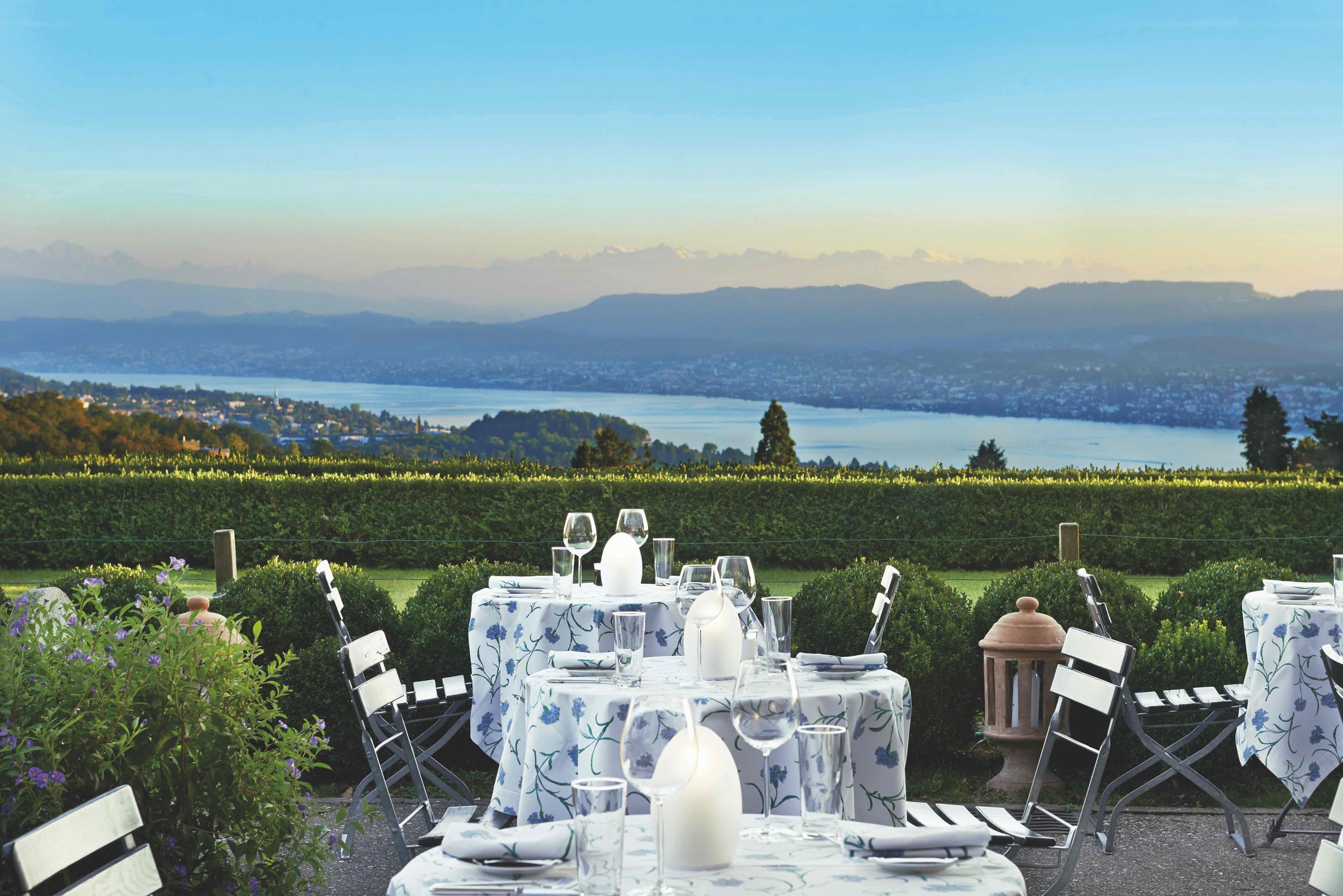 Outdoor dining terrace overlooking Lake Zurich