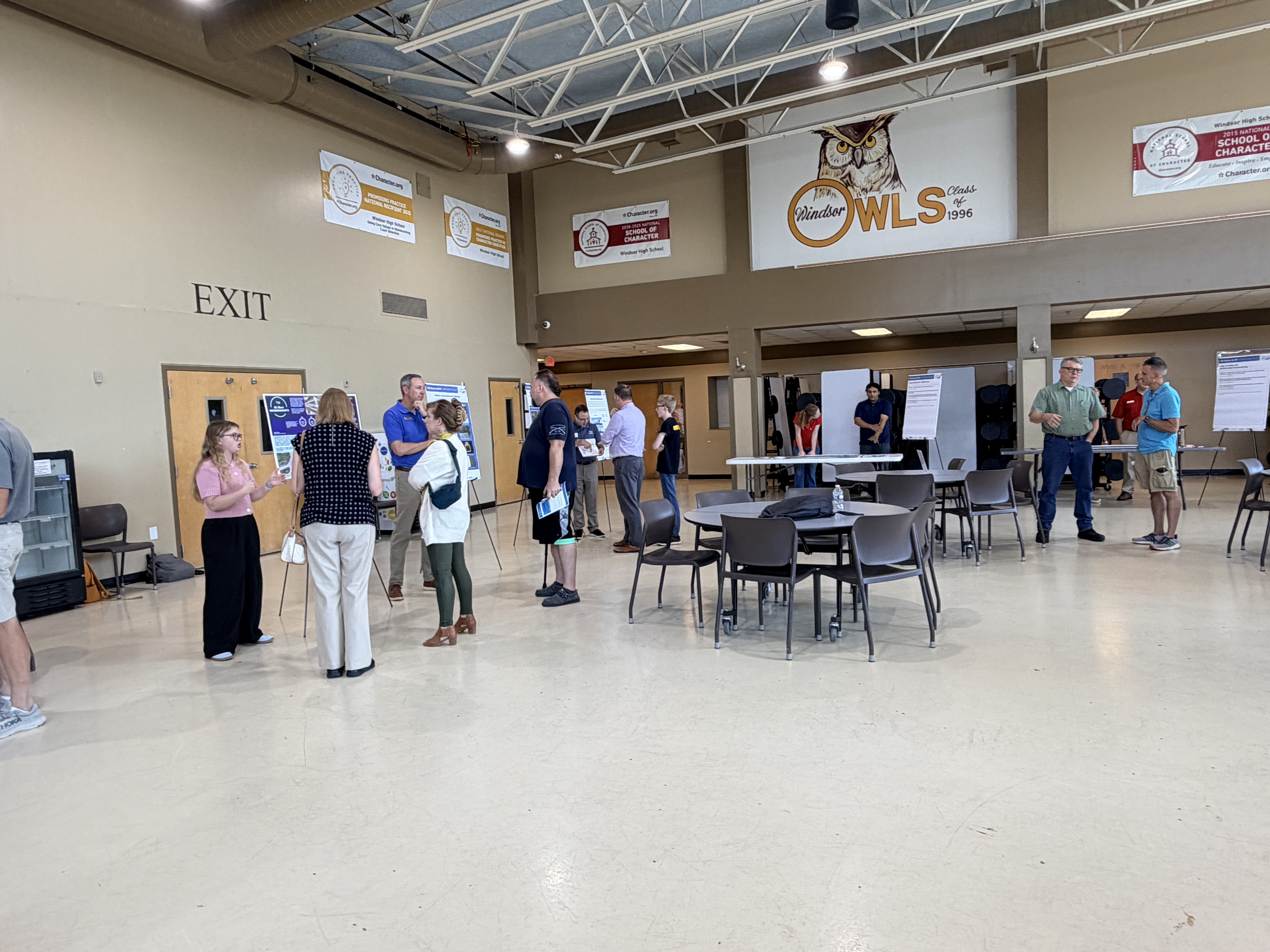 Residents and MoDOT representatives attending the Highway 61/67 open-house meeting at Windsor High School