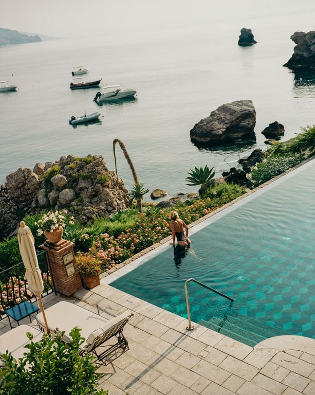 Infinity pool overlooking Mazzarò Bay at Villa Sant’Andrea