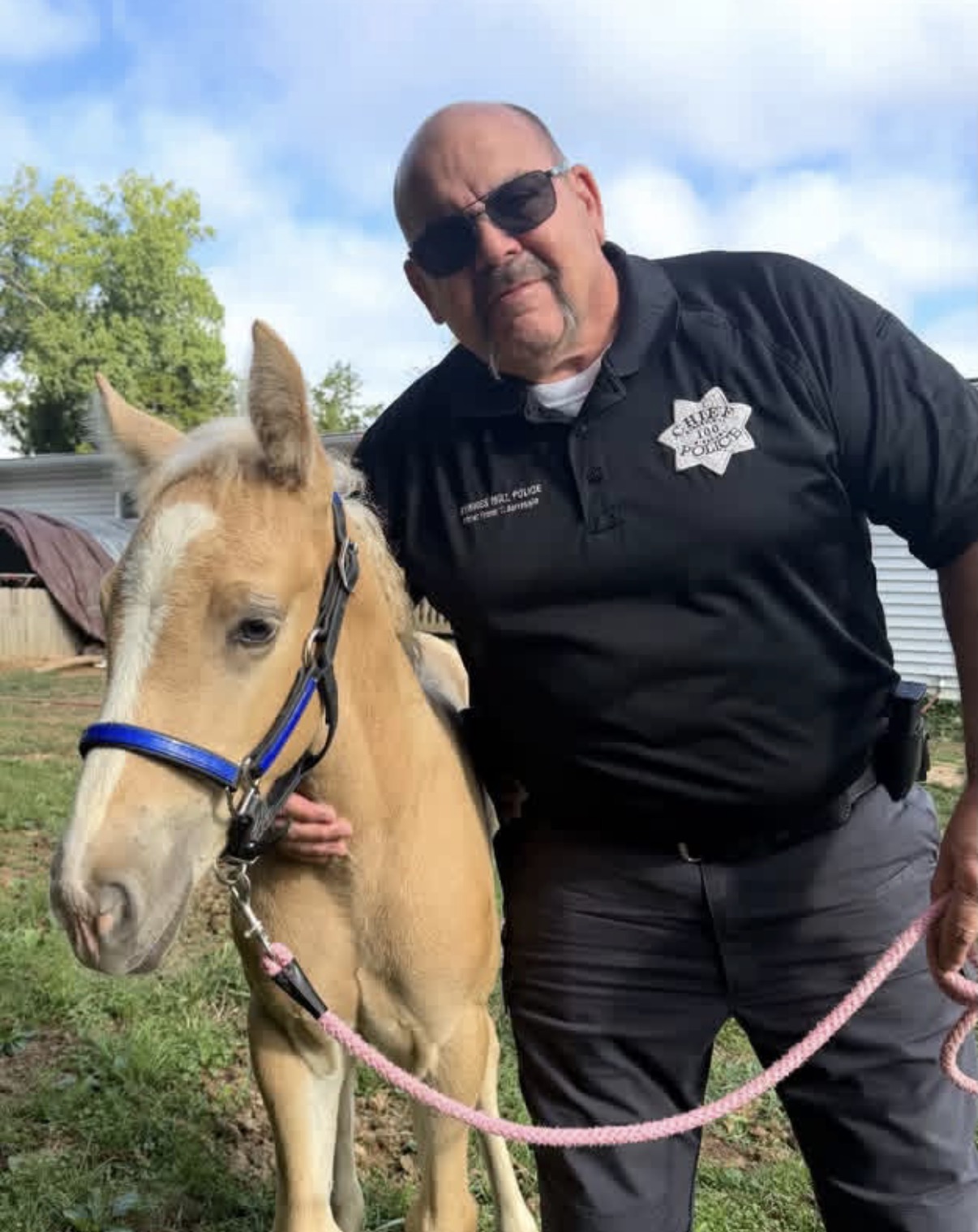 Byrnes Mill Police Chief Frank Selvaggio with Chief the colt