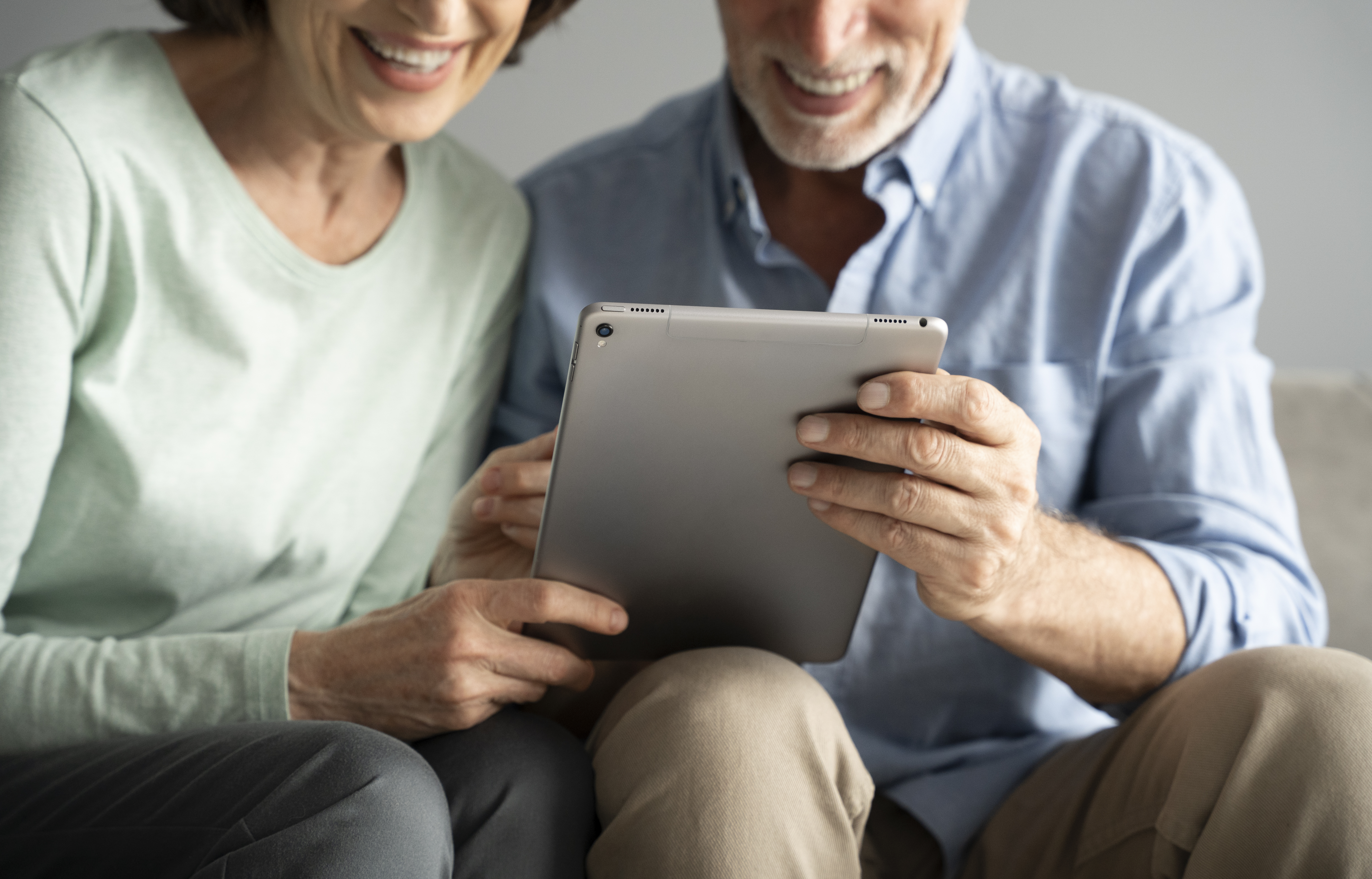 Senior using tablet