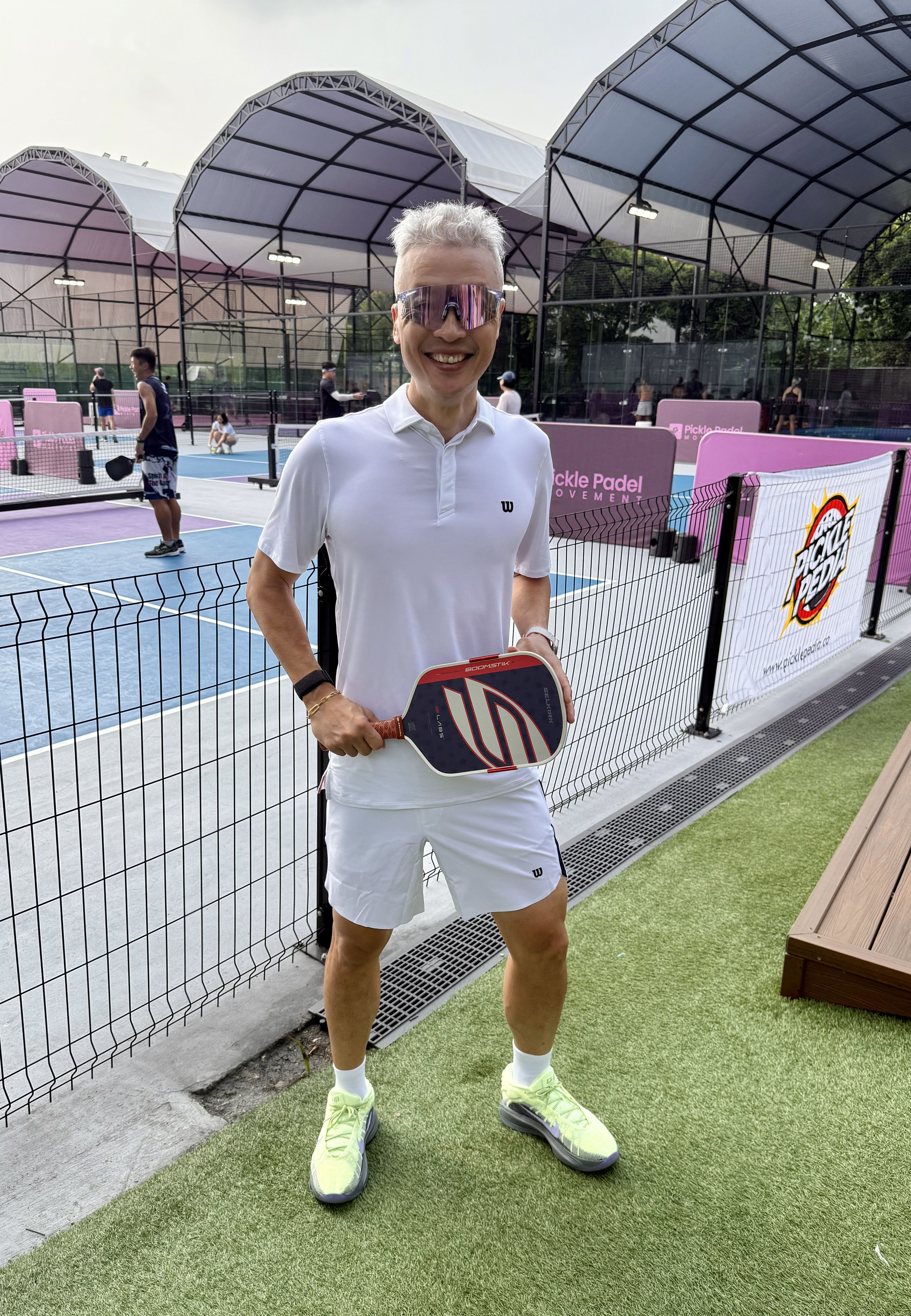 Alvin, in all-white like he is meeting Pickleball constituents