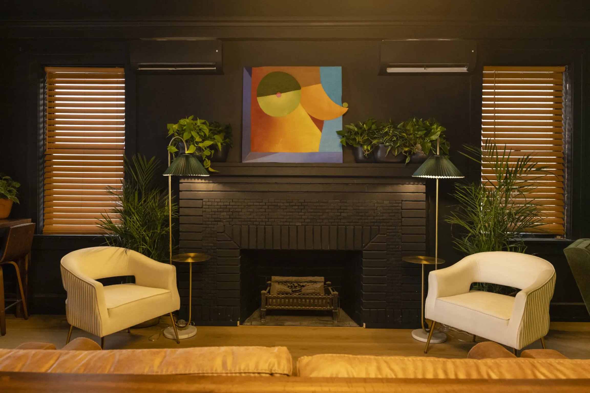 Fireplace and seating in the lobby of The 1888 Hotel