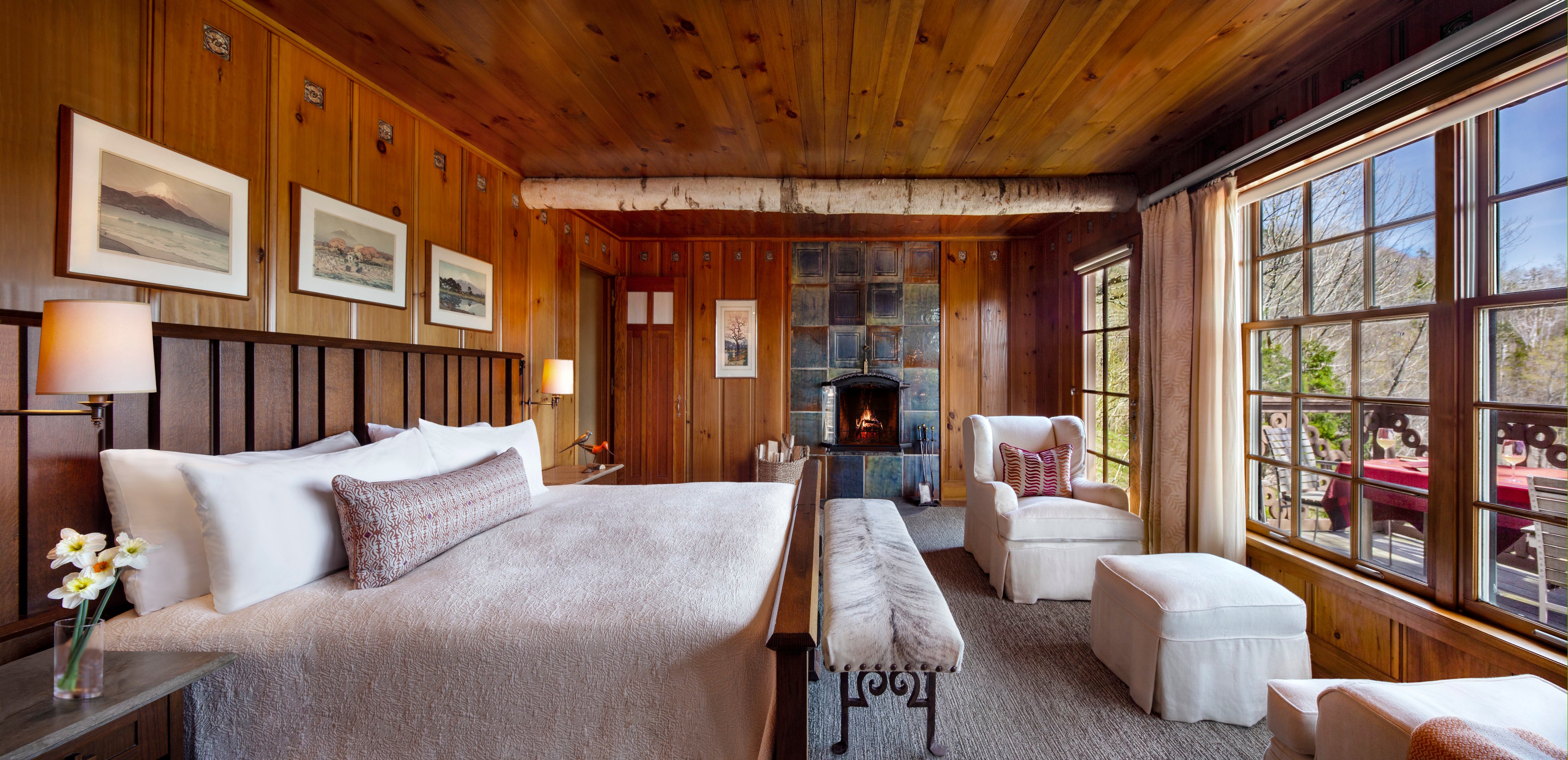 Guest bedroom with woodland views at Twin Farms