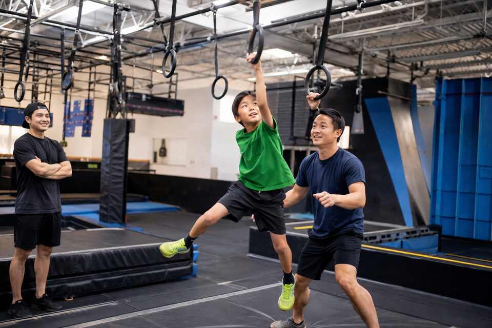 A child and parent enjoying a supervised indoor ninja obstacle course in Richmond BC