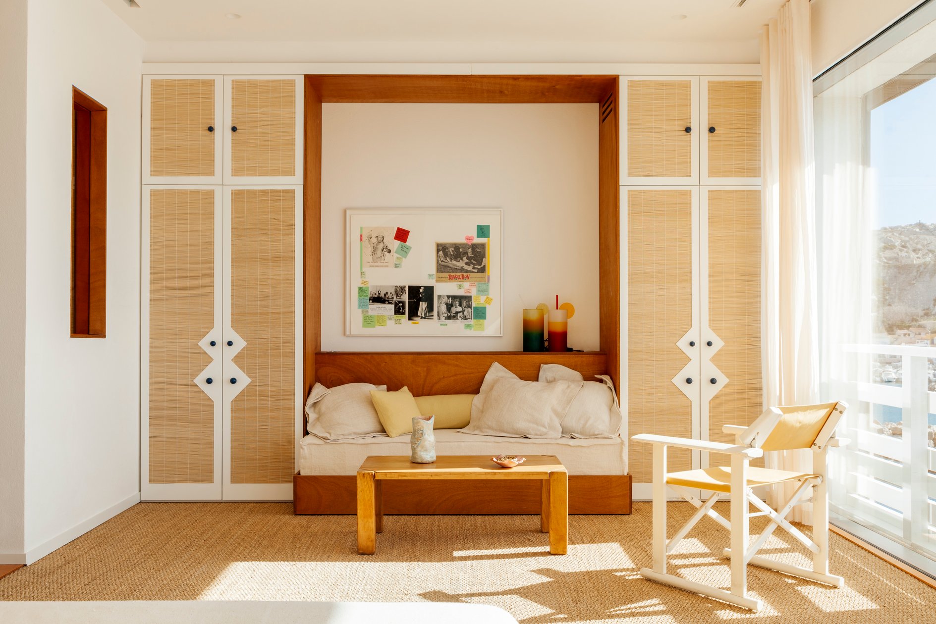 Sunlit Tuba Club suite with pale wood details and built-in seating