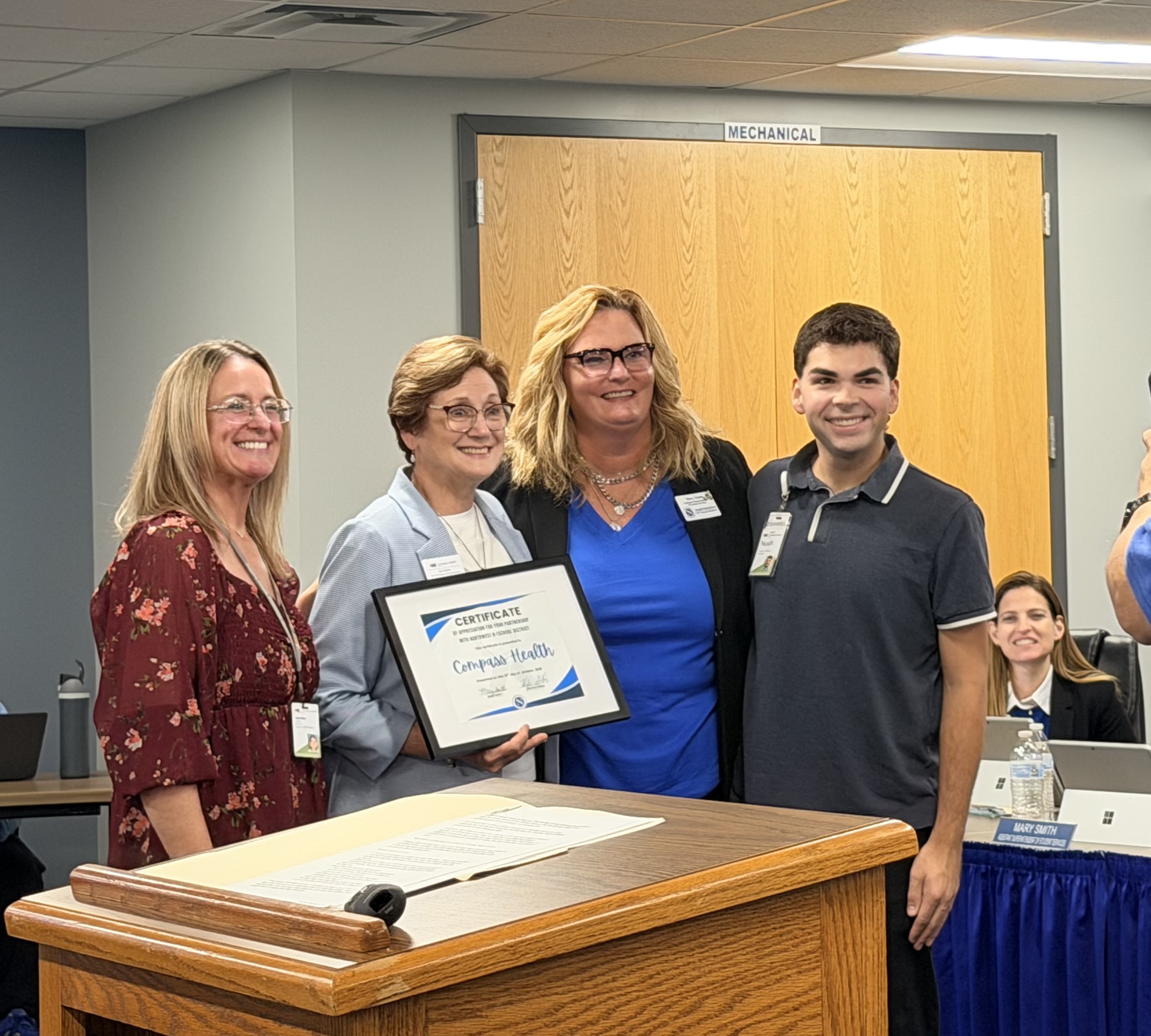 Compass Health Network recognition at Northwest School Board meeting