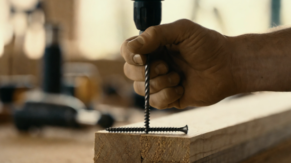 Driving a wood screw straight into lumber with a hand drill