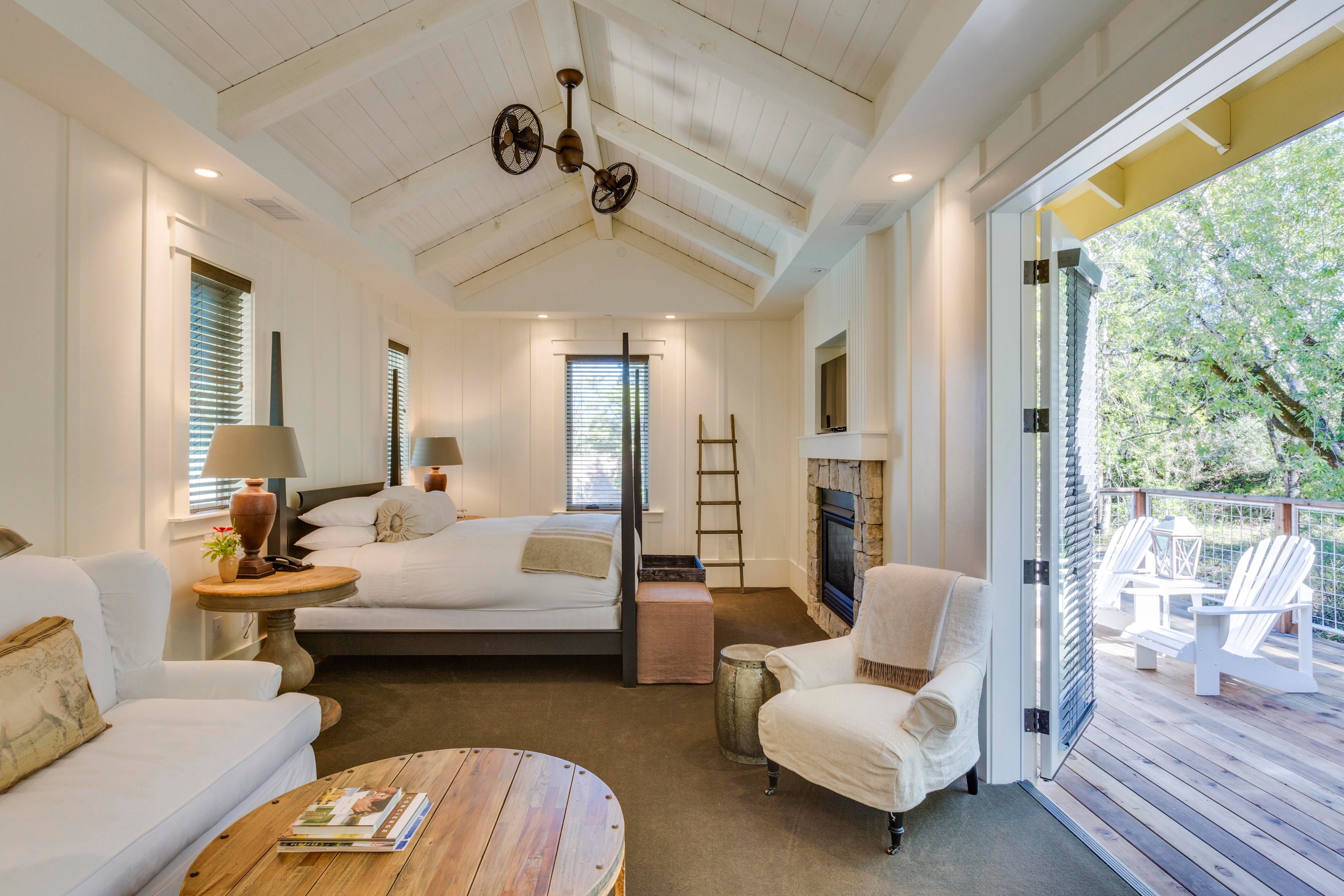 Guest room with high ceilings at Farmhouse Inn
