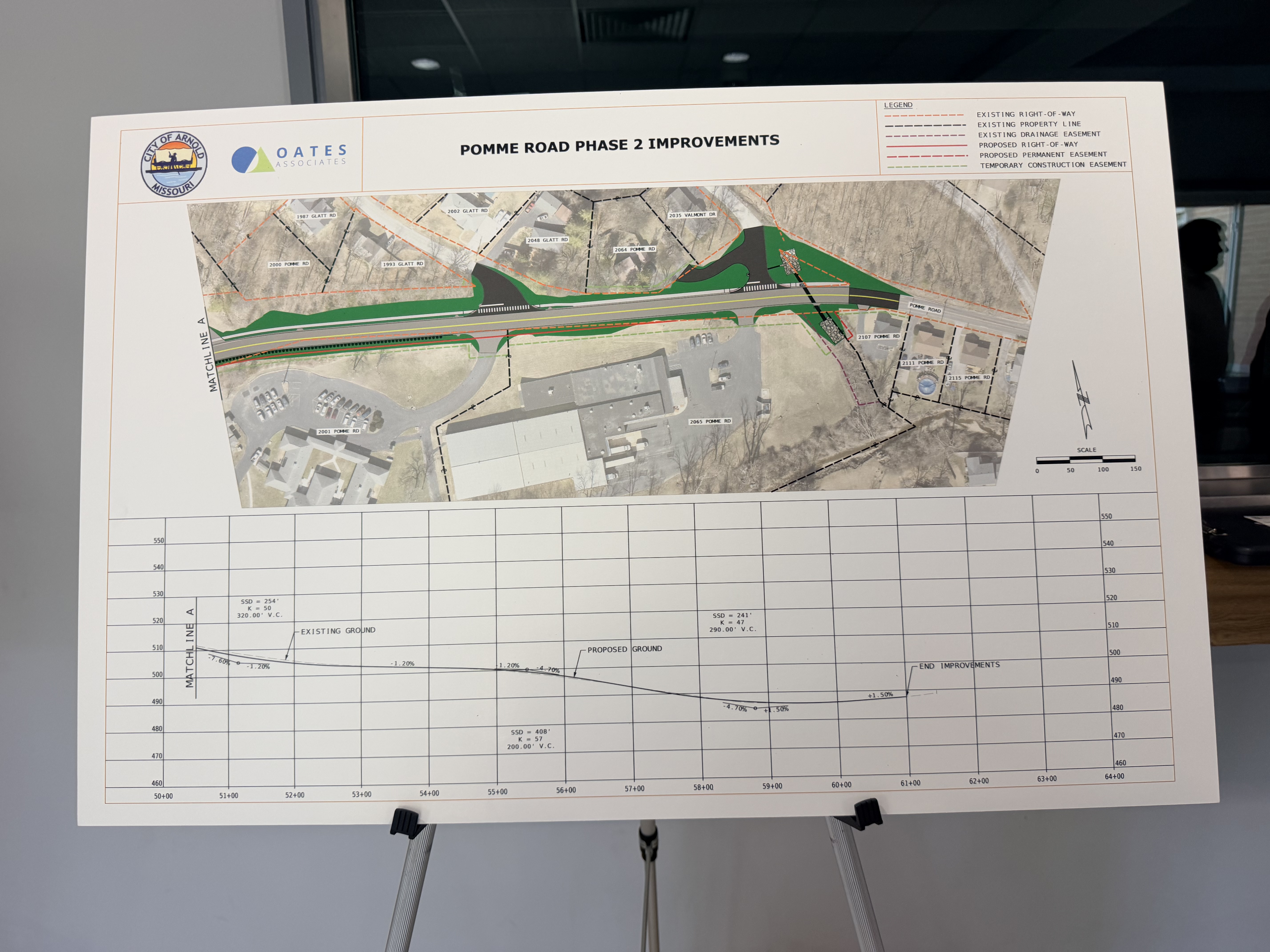 Pomme Road Phase 2 project board showing proposed elevation and roadway profile changes