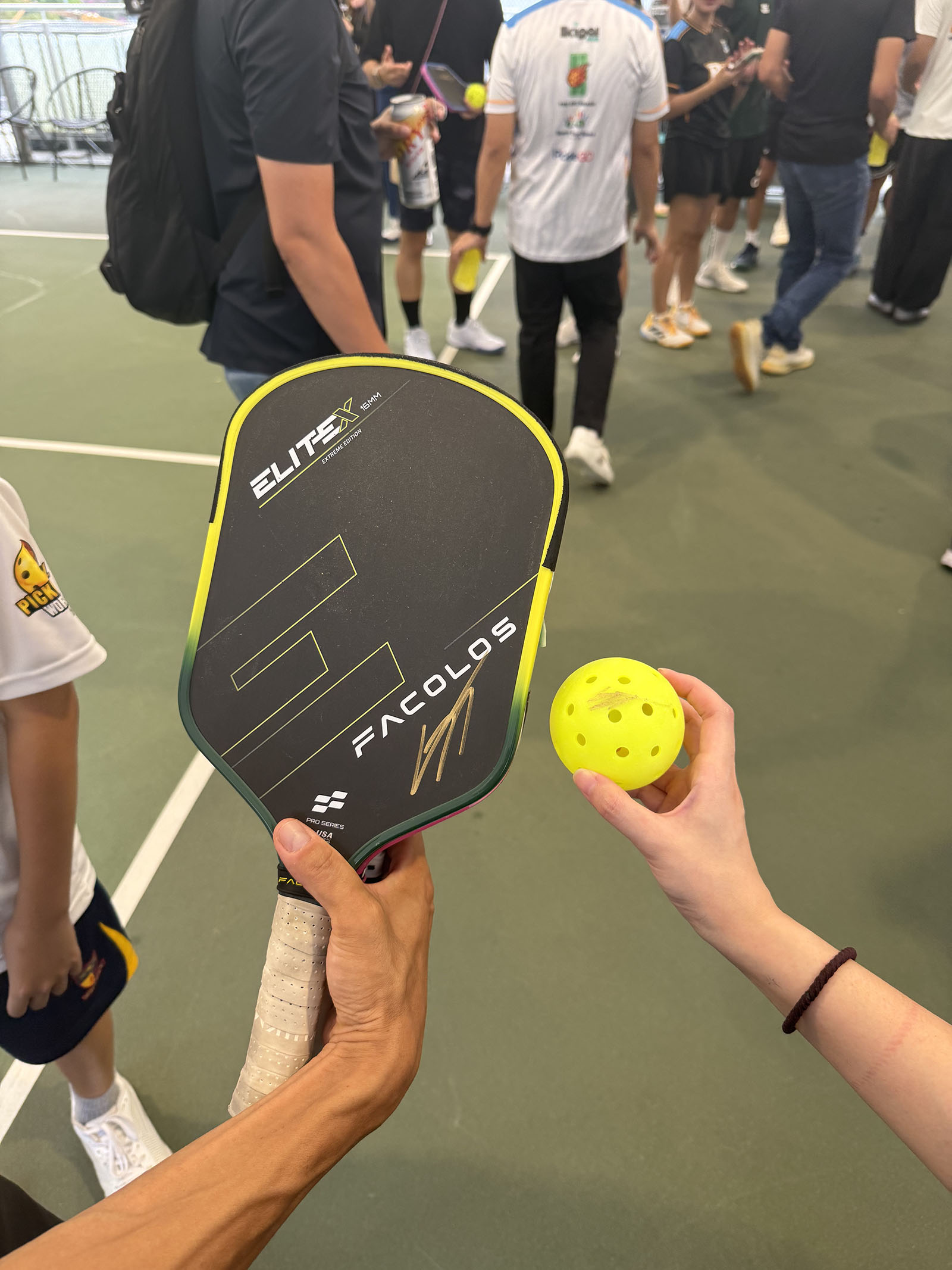 Gabe co-designed the Facolos Elite X V2 sooo it's only fitting that the paddle carries his autograph. (Not sure who snuck a ball in there.)