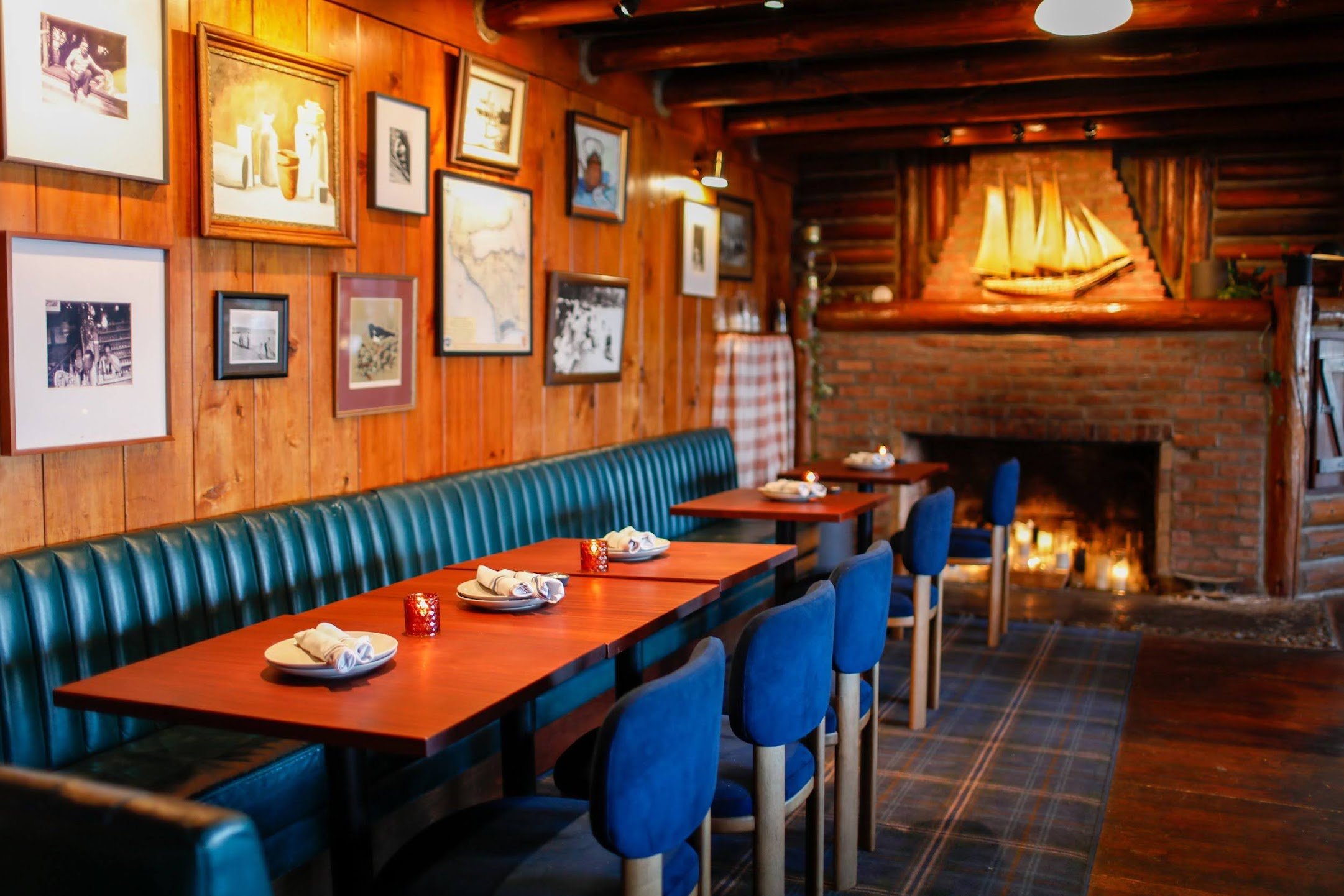 Restaurant with a fireplace at Captain Whidbey
