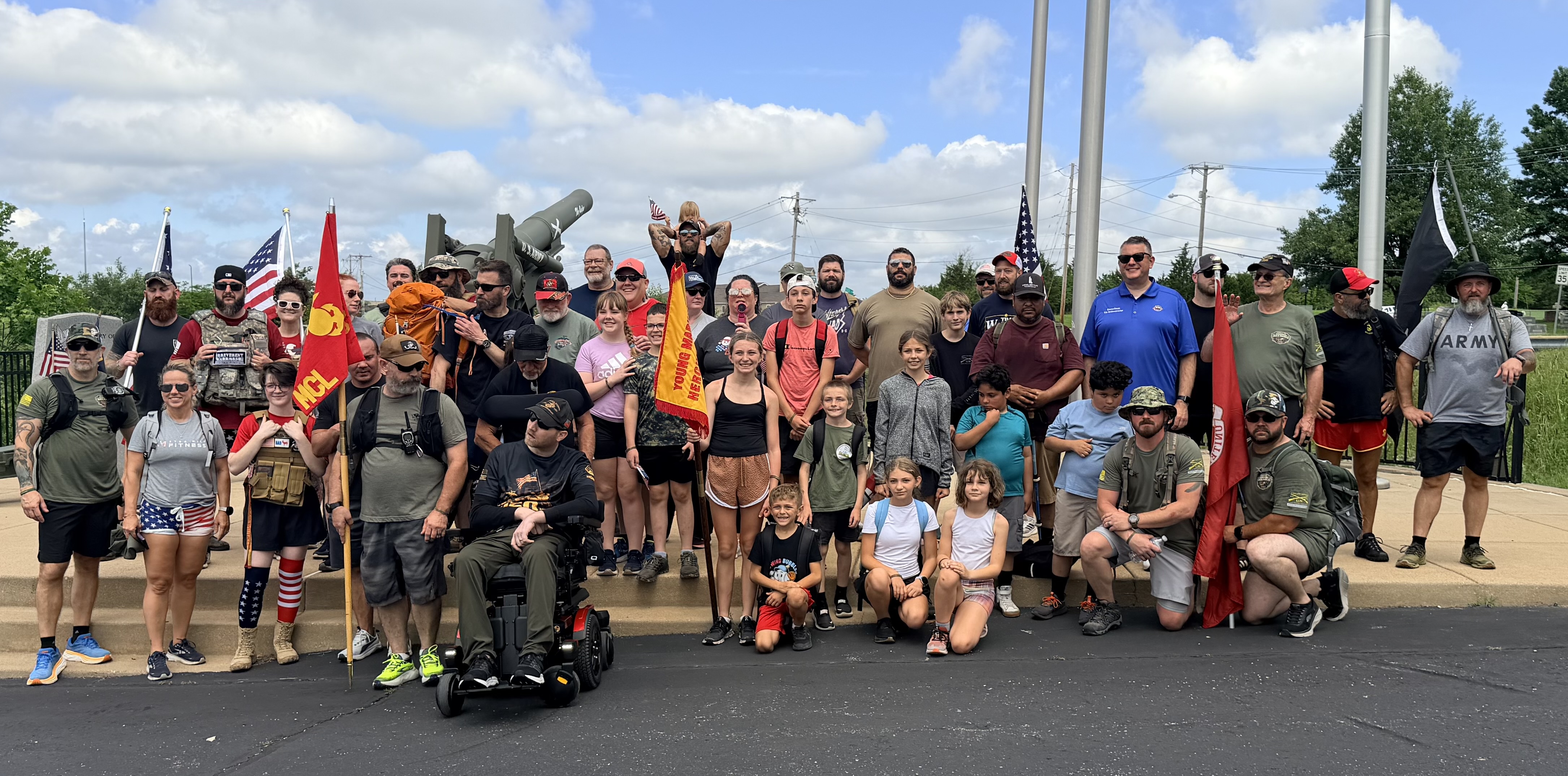 Participants gathered near the memorial cannon at the Arnold VFW after the second annual Ruck March