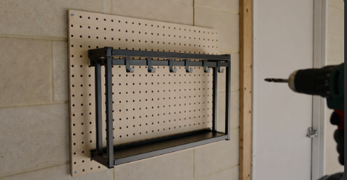 Neat garage wall rack for tools and gear