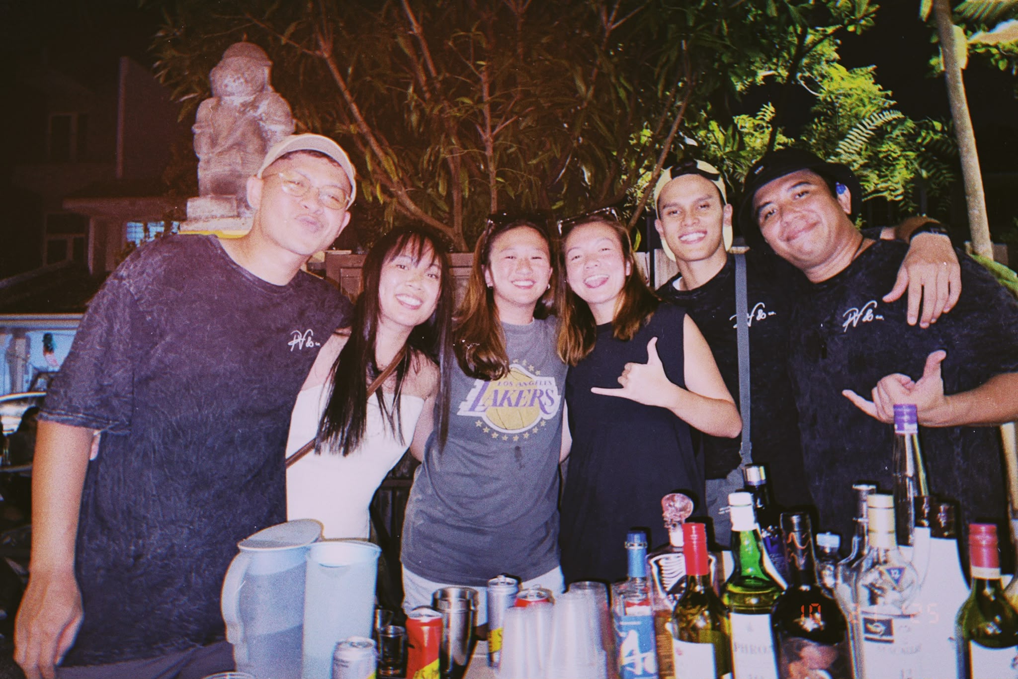 Rizza, friends, gangland signs...