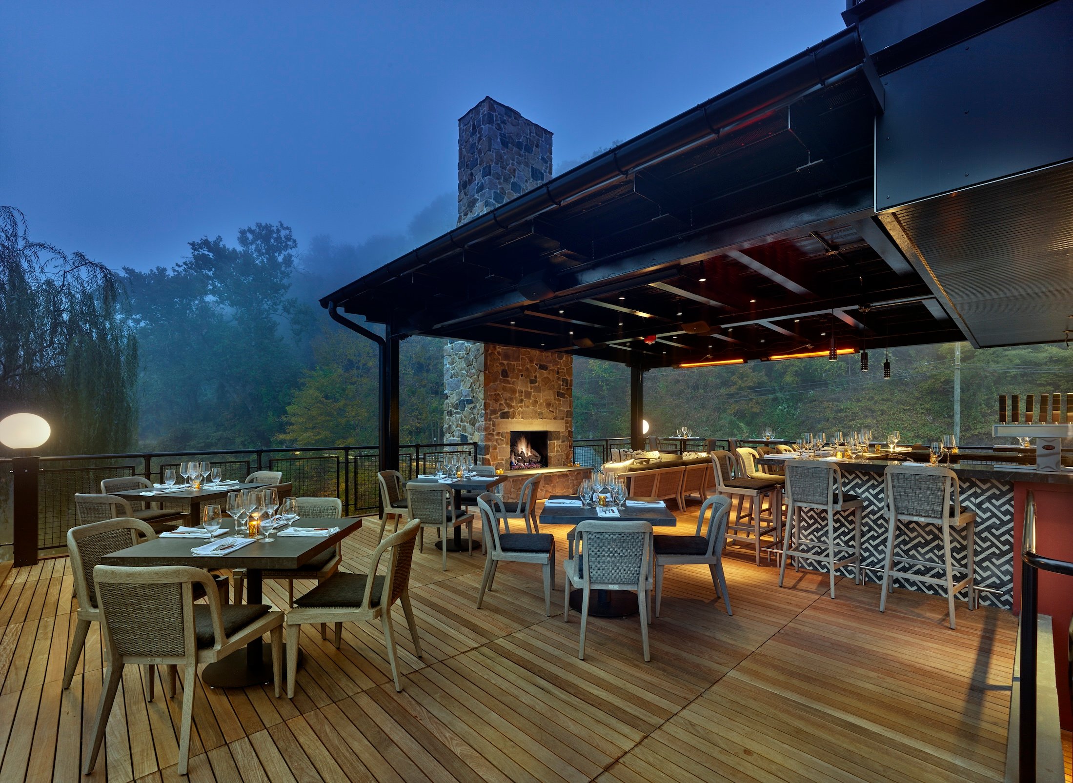 Outdoor dining terrace at The River House at Odette’s
