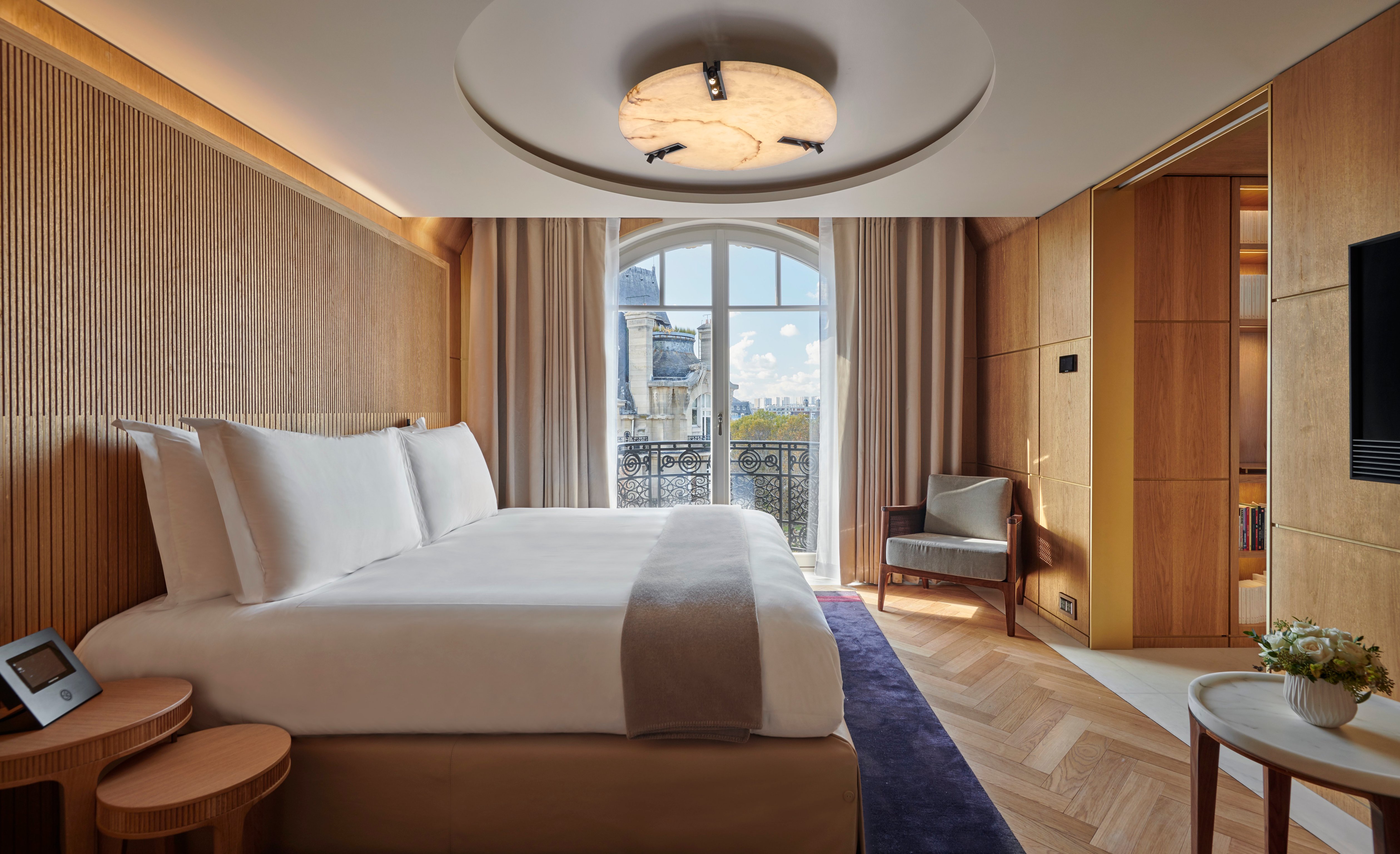 Warm wood-paneled guest room at Hôtel Lutetia
