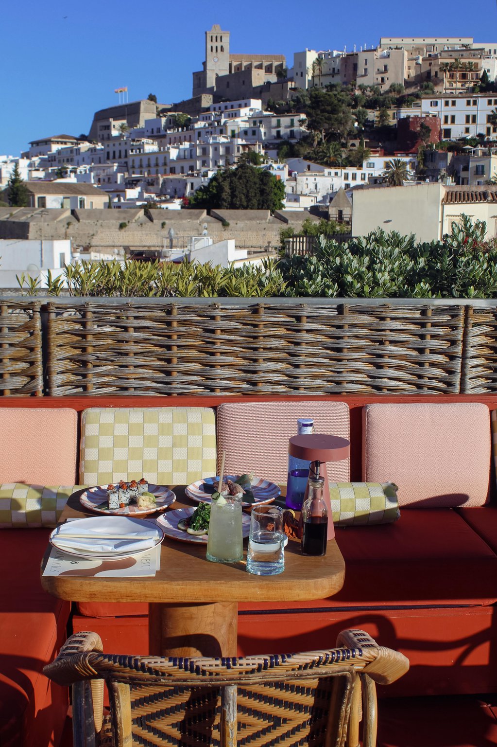 Rooftop dining with a view of Dalt Vila