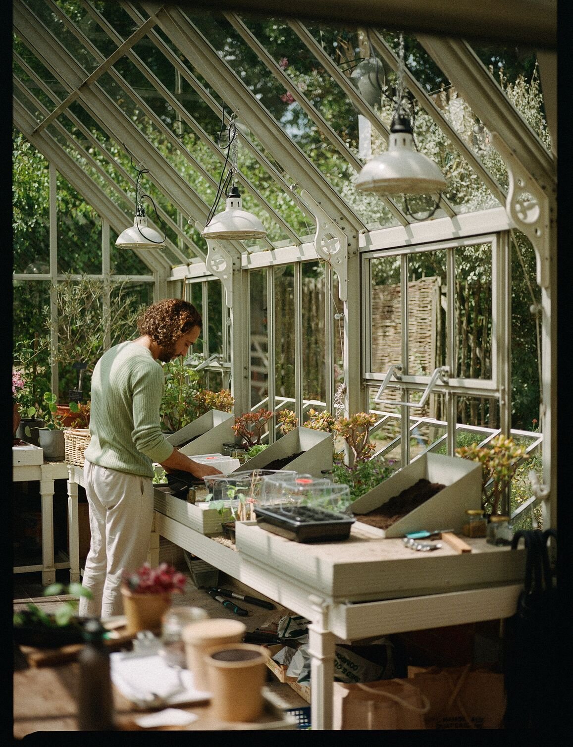 Gardening activity inside a glasshouse at Le Manoir aux Quat’Saisons