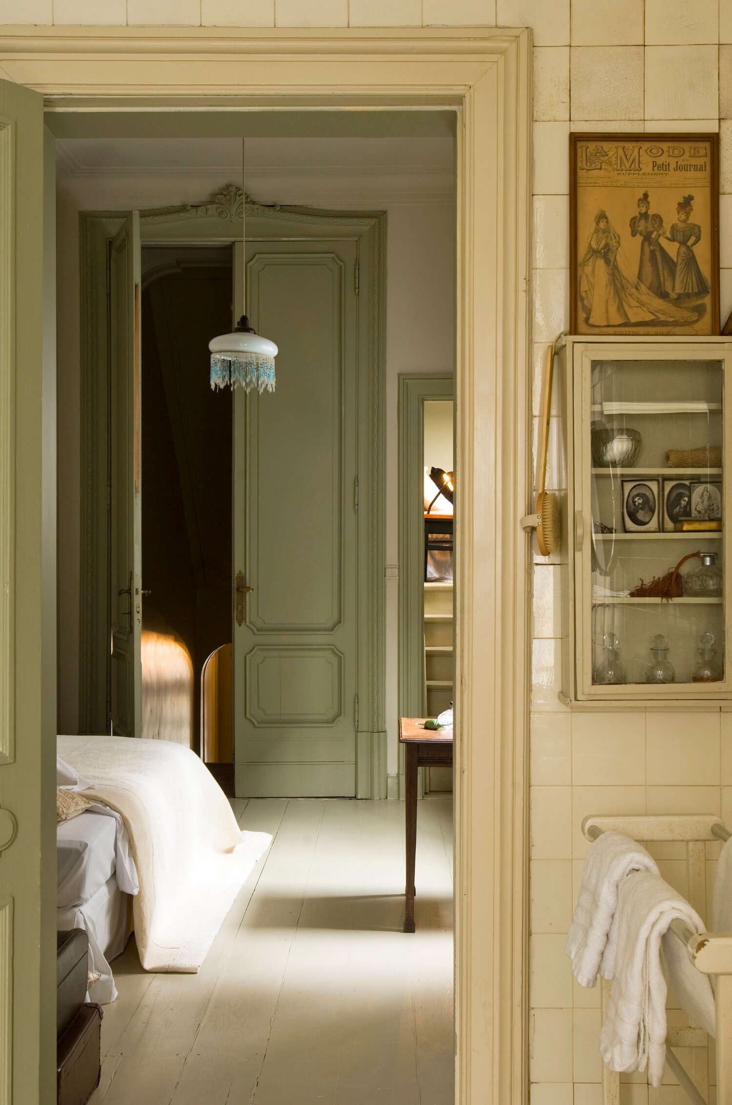 View through an ornate doorway at Boulevard Leopold Rooms and Suites