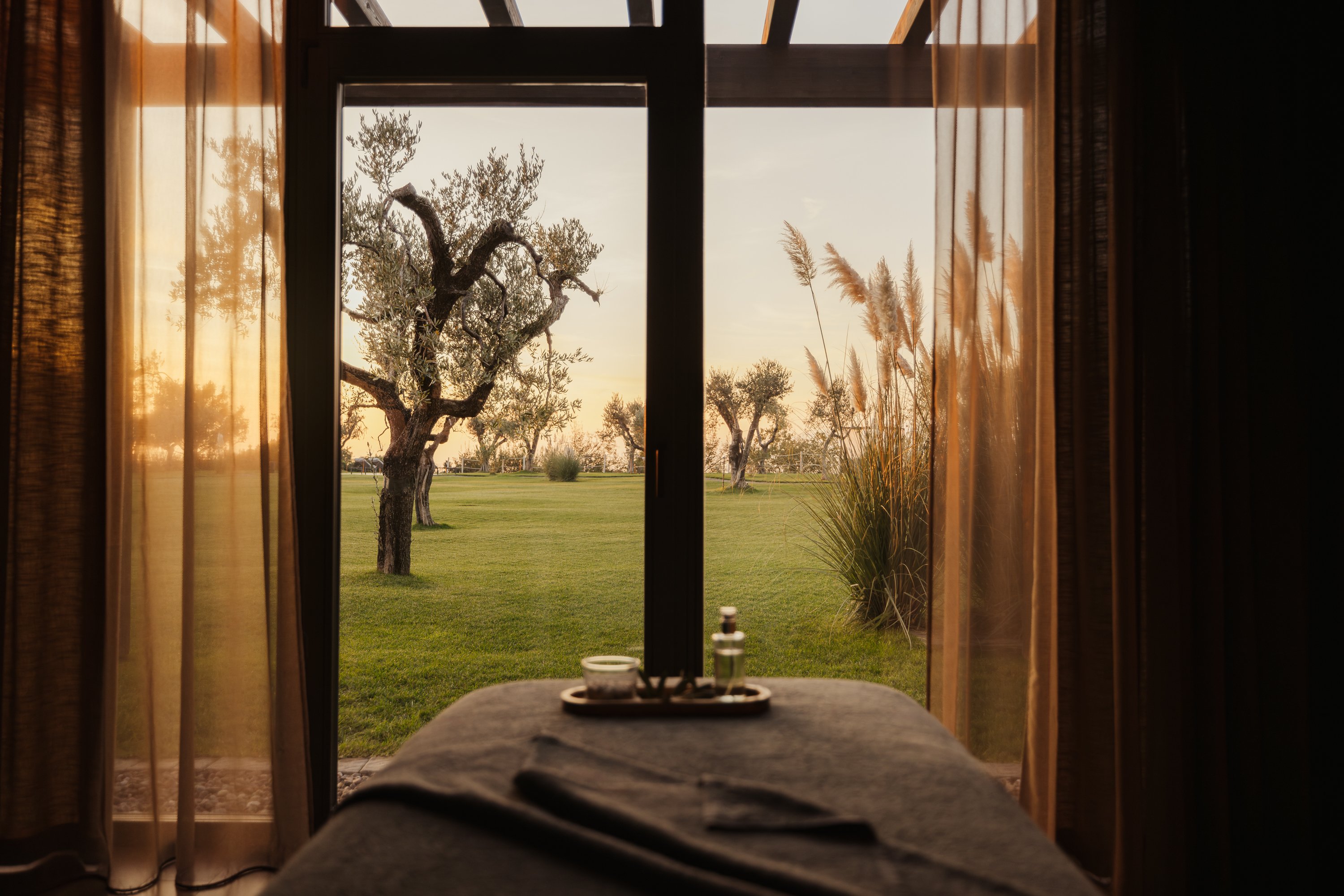 Spa treatment room overlooking olive trees at Cape of Senses