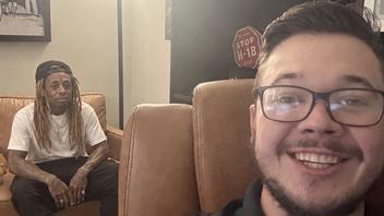 Lil Wayne chilling in Kyle Rittenhouse's office on a couch that doesn't exist