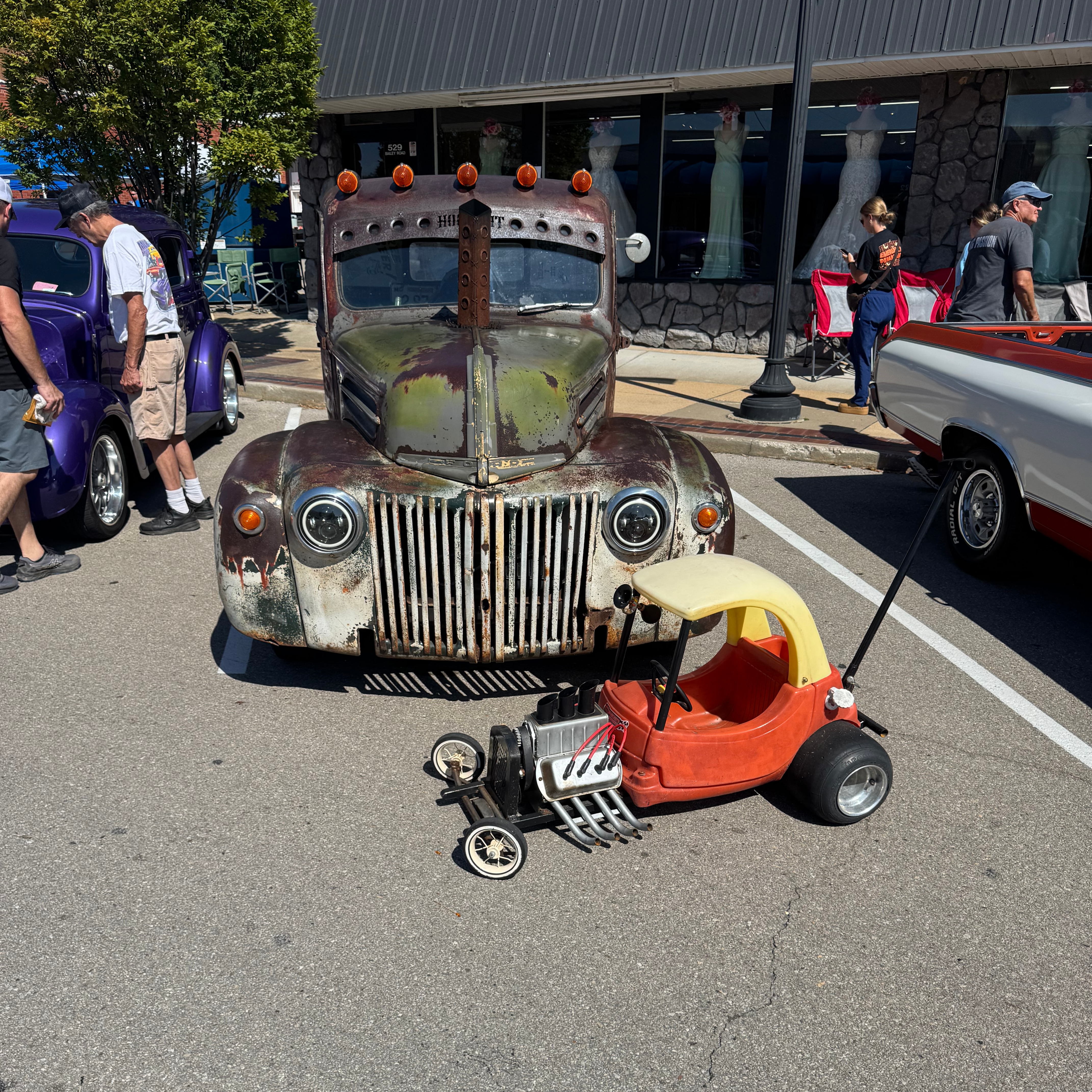 Visitors viewing cars at the Twin City Days car show