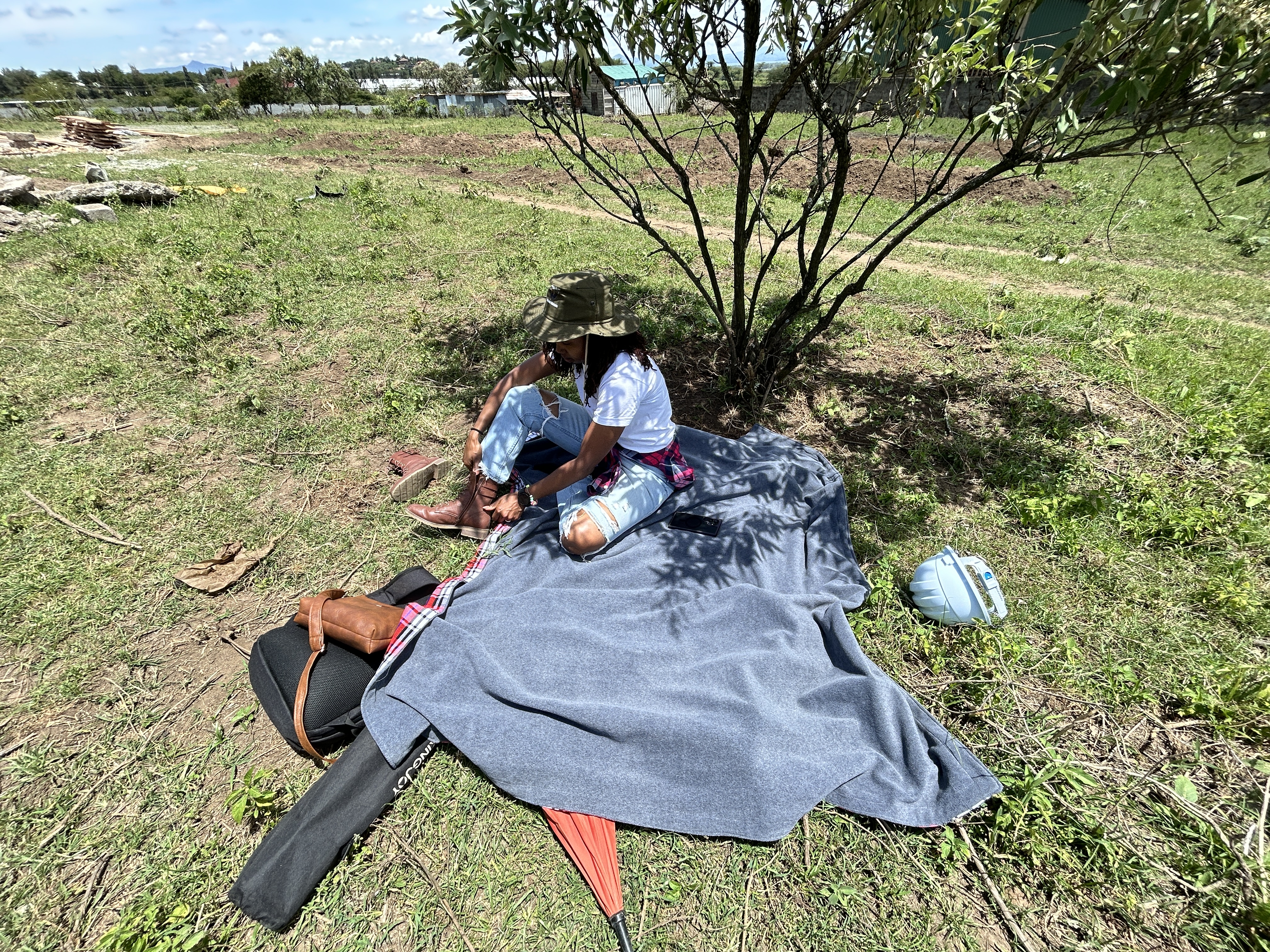 Blanket, umbrella, snacks — above Lake Naivasha