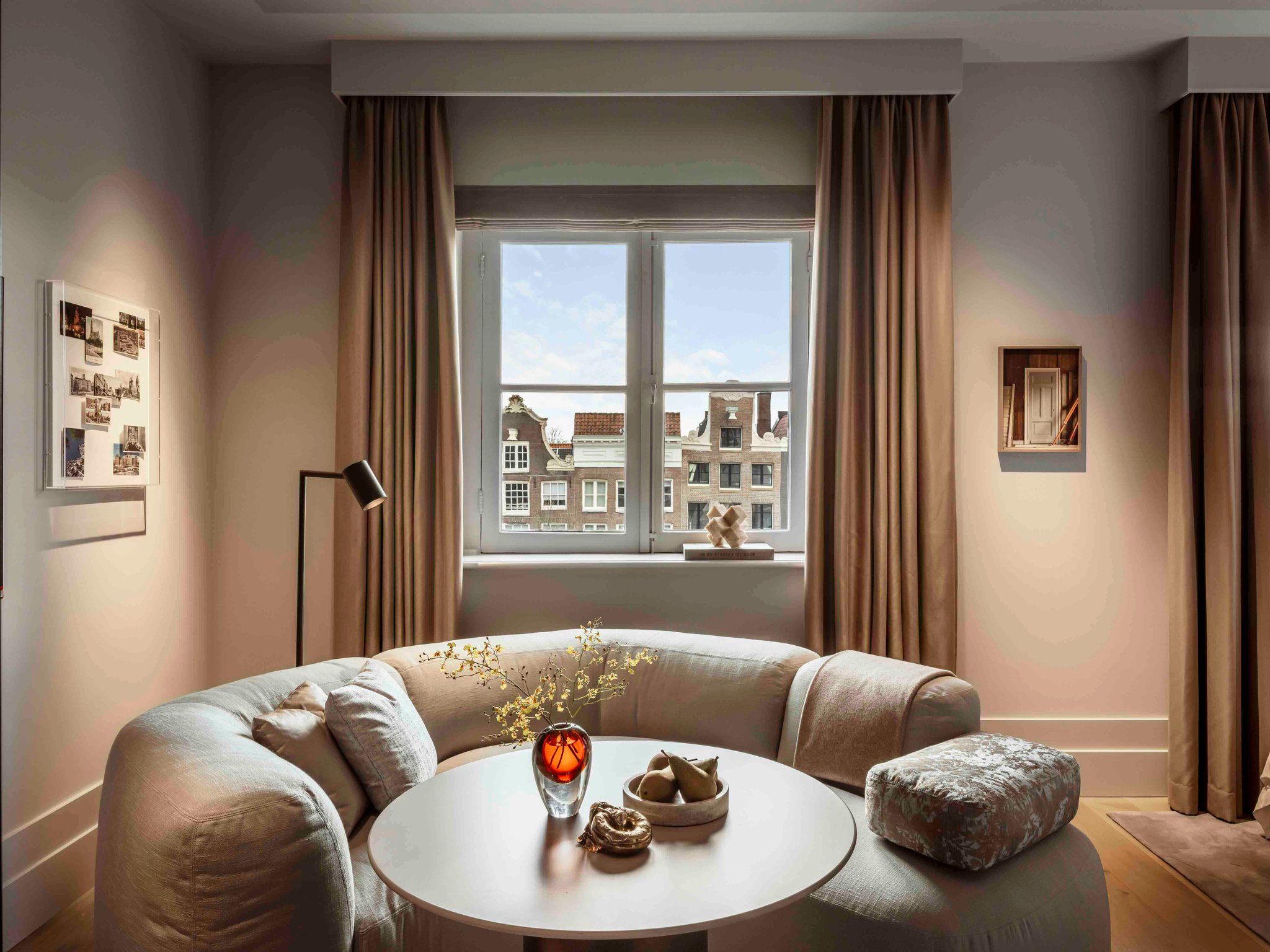 Canal-facing living room at Rosewood Amsterdam