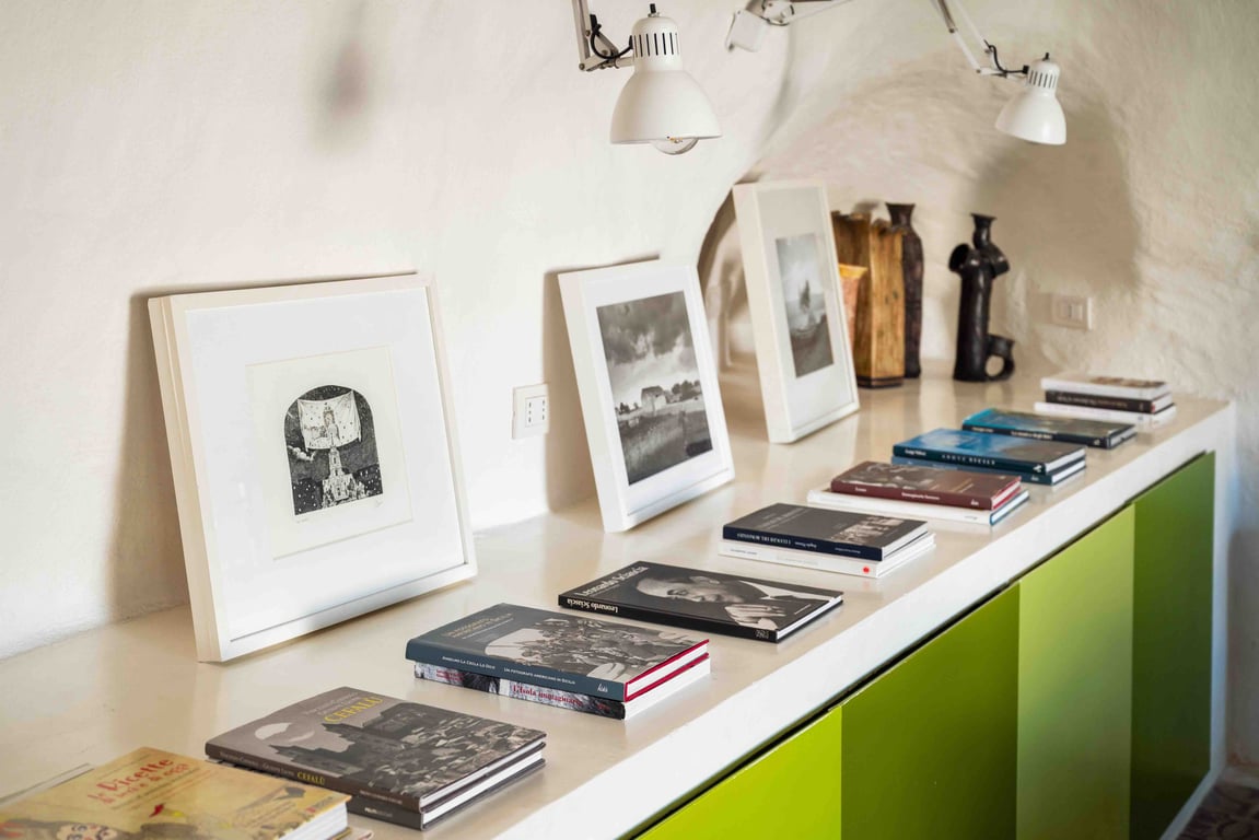 Books and framed art inside Casa Talia