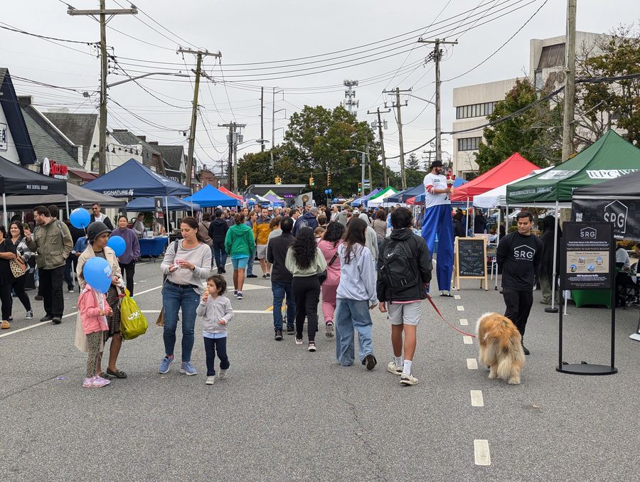 An earlier Syosset Street Fair, in a photograph published by Nassau County Fairs.